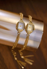 "שעון יד יוקרתי לנשים עם רצועת מתכת בעיצוב רטרו"