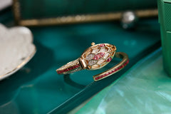 ✨ שעון קווורץ לנשים עם עיצוב נחש וצמיד ריינסטון – מתנה אופנתית לאישה 💎