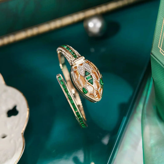 ✨ שעון קווורץ לנשים עם עיצוב נחש וצמיד ריינסטון – מתנה אופנתית לאישה 💎