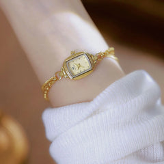 "שעון יד יוקרתי לנשים עם רצועת מתכת בעיצוב רטרו"