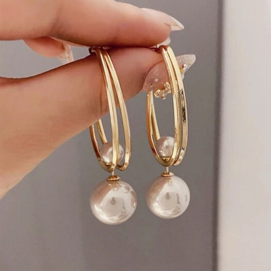 עגילי פנינה בסגנון הבארוק בזהב