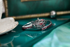 ✨ שעון קווורץ לנשים עם עיצוב נחש וצמיד ריינסטון – מתנה אופנתית לאישה 💎