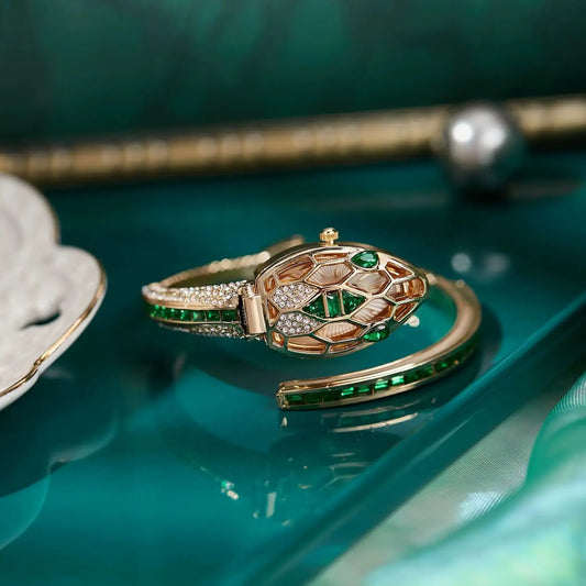 ✨ שעון קווורץ לנשים עם עיצוב נחש וצמיד ריינסטון – מתנה אופנתית לאישה 💎