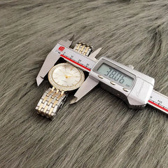 "שעוני נשים יוקרתיים עם רצועת נירוסטה ואבני ריינסטון, מנגנון קוורץ, מותג על, שעוני יד אופנתיים לנשים."