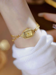 "שעון יד יוקרתי לנשים עם רצועת מתכת בעיצוב רטרו"