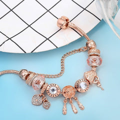 צמיד לוכד חלומות ורוד עם צ'ארמס כלול בכסף